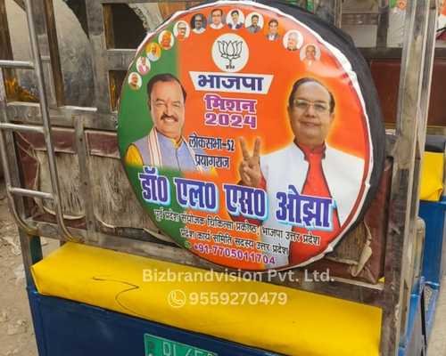 Stepney cover printing and installation service for E-rickshaws by Bizbrandvision Pvt. Ltd.